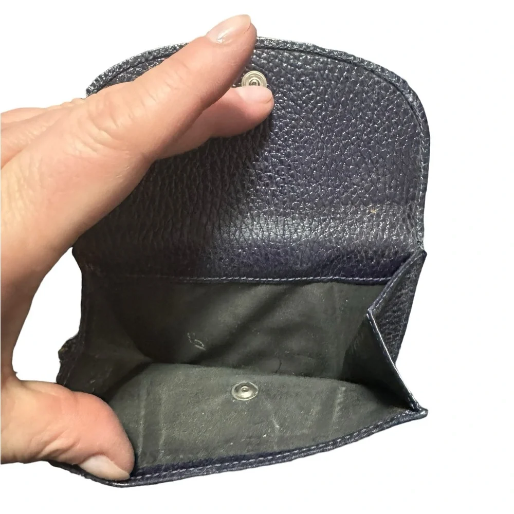 Dark navy leather wallet with exterior coin compartment. GUC